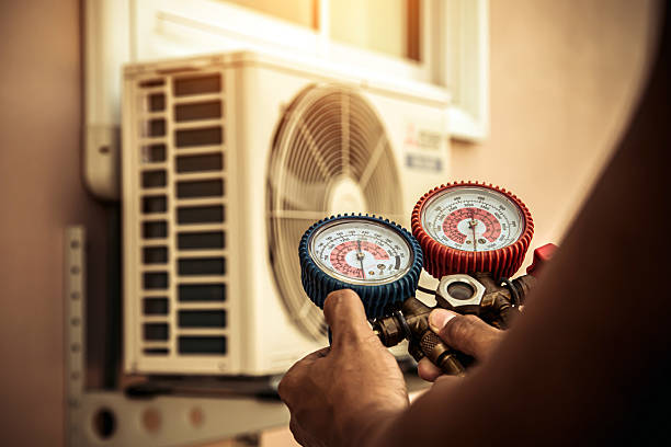 Professional Heat Pump Repair technician working in Shelby, IN